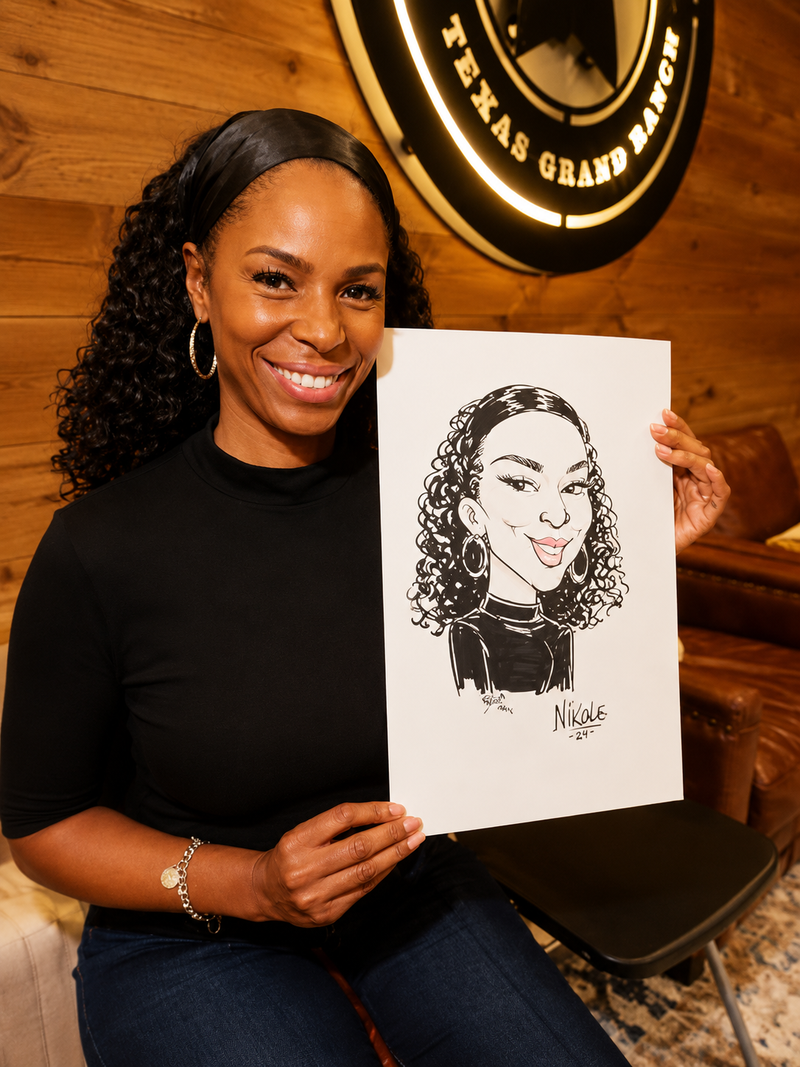 Woman holding her black-and-white caricature at an indoor community partner event