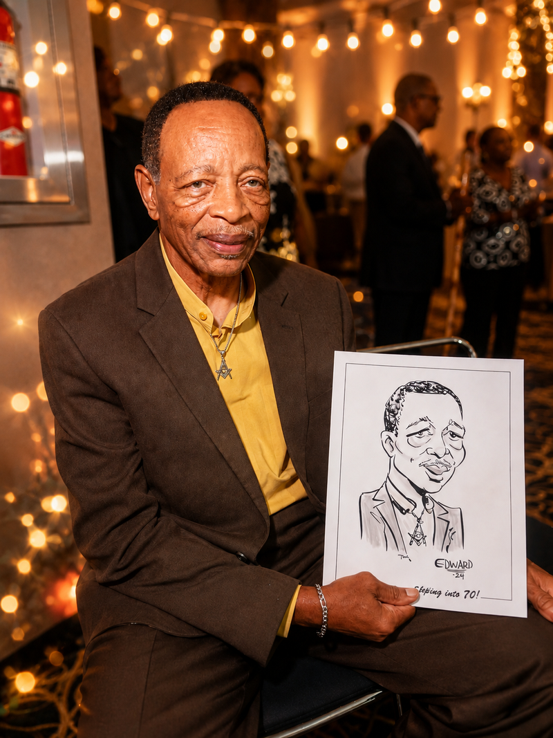 Gentleman in a brown suit holding his black-and-white caricature at a milestone birthday celebration
