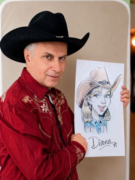 Caricature artist Martin Tremblay in western attire with a caricature of Diana
